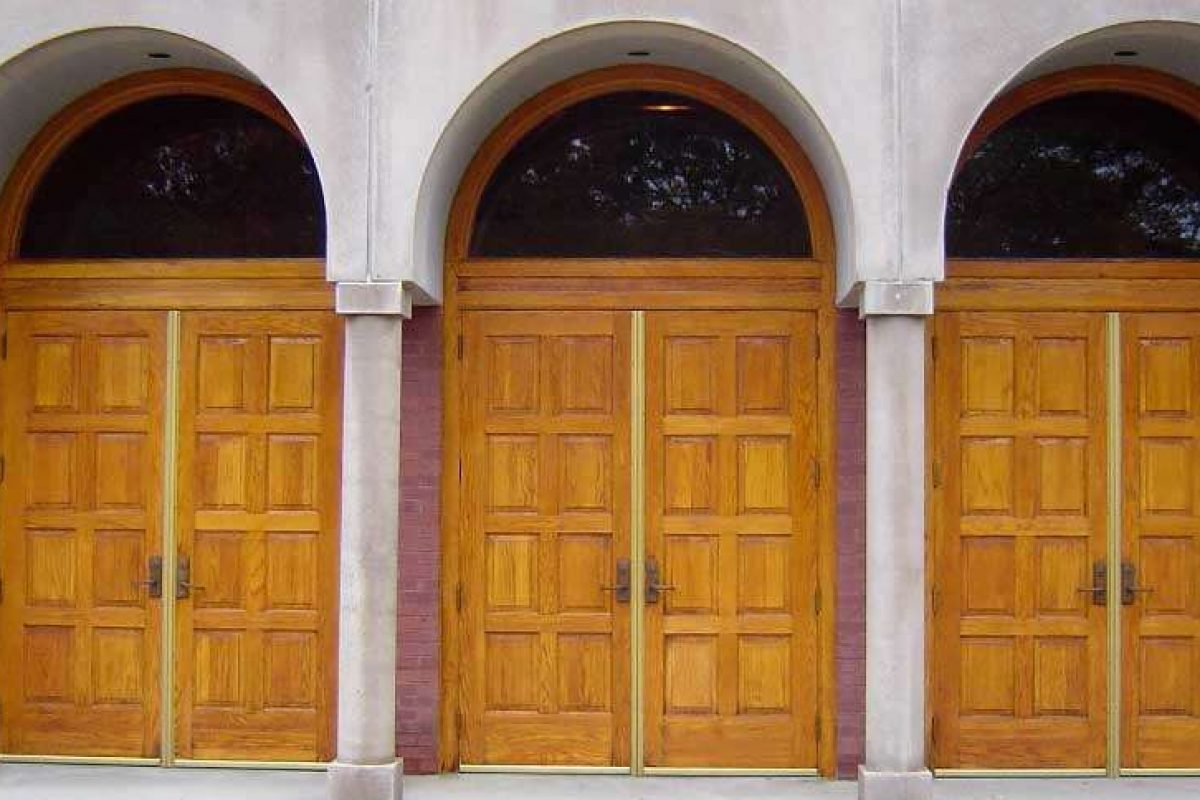 After photo of doors updated with stain varnish by Liberty Painting.