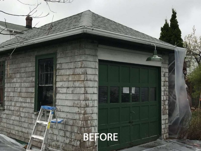 A before of a Quincy Garage and the damaged exterior.