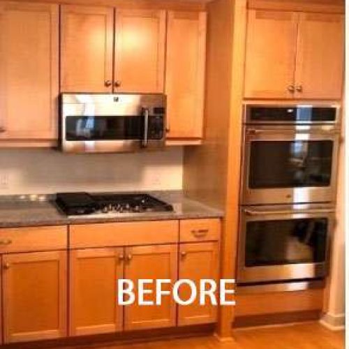 A before photo of an outdated kitchen with lighter wood cabinets.