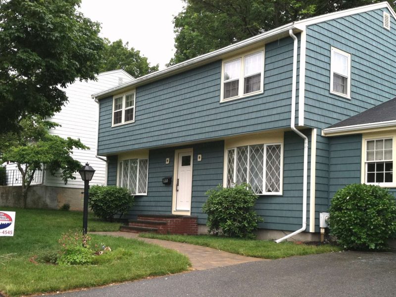 A photo of a finished project updating the siding on a home in Milton.