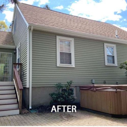 An after photo of a Liberty Painting project updating the siding of the back of a home in West Quincy.