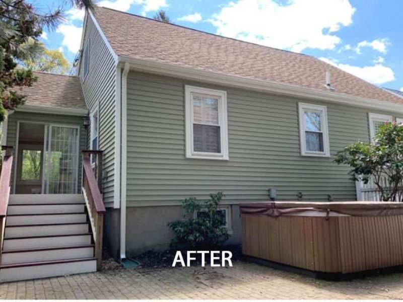 An after photo of a Liberty Painting project updating the siding of the back of a home in West Quincy.