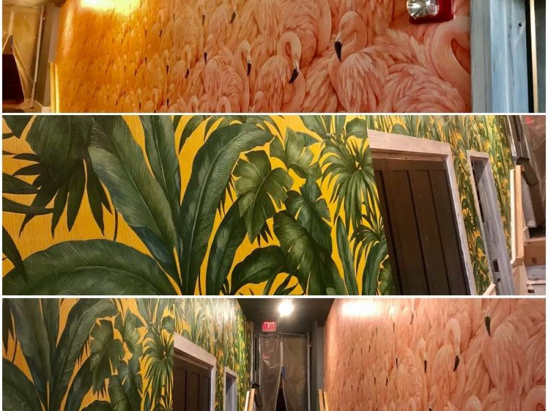 A photo of expertly applied tropical and flamingo patterned wallpaper by Liberty Painting.