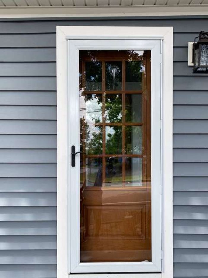 An after photo of a newly installed door in Canton, MA by Liberty Painting.