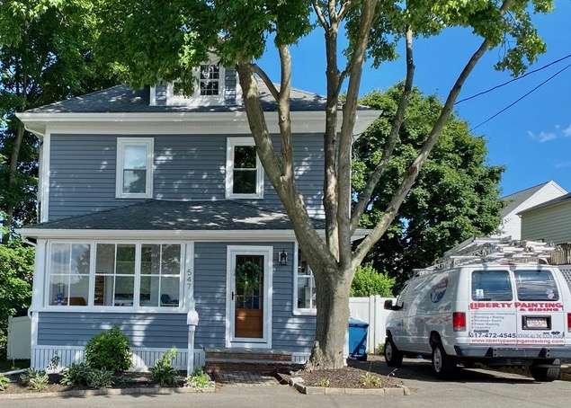 An after photo of new siding on a house in Canton, MA