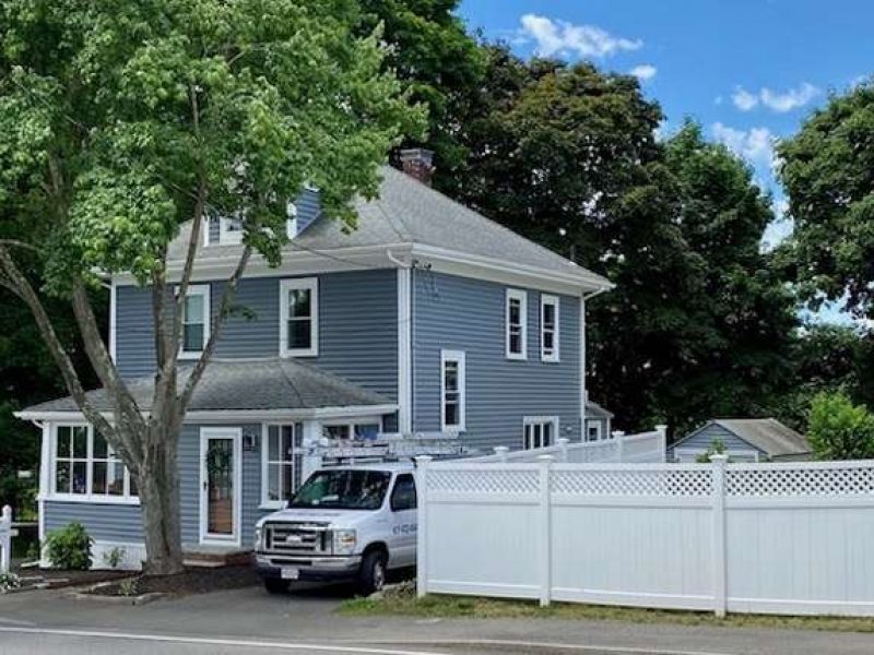 An after photo of new siding on a house in Canton, MA - second angle