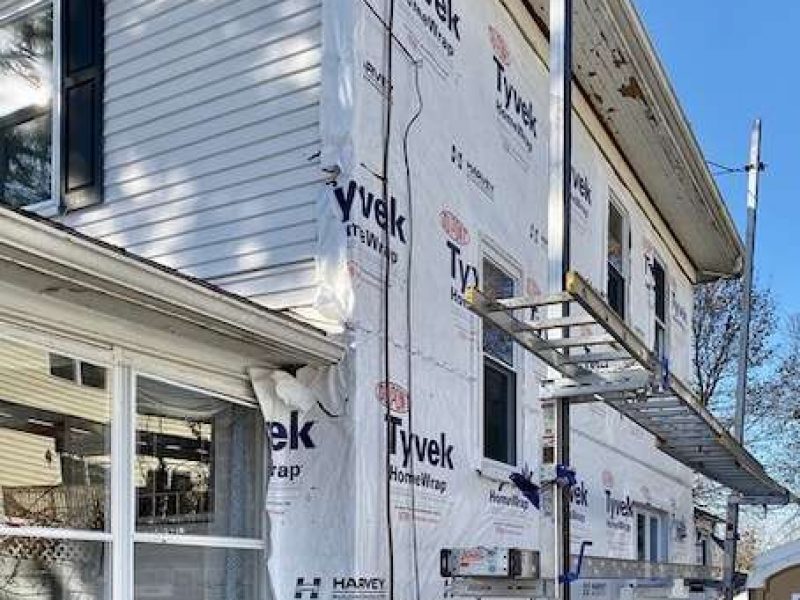 A photo taken during the project on a house in Canton, MA which needed new siding.